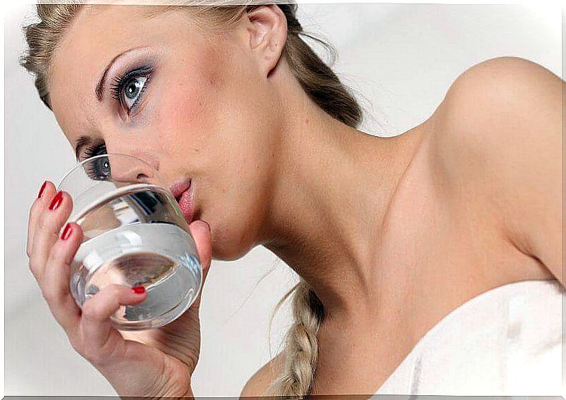 Woman drinks water