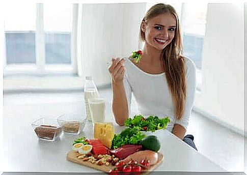 A woman eating a salad