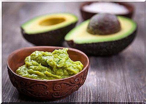 Guacamole and avocados on the table