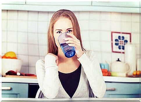 Woman drinks water