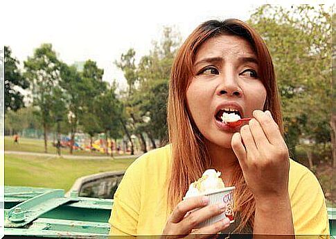 Woman eats comfort food ice cream