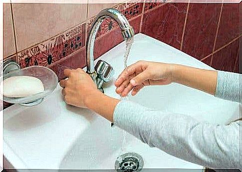 Woman washing her hands