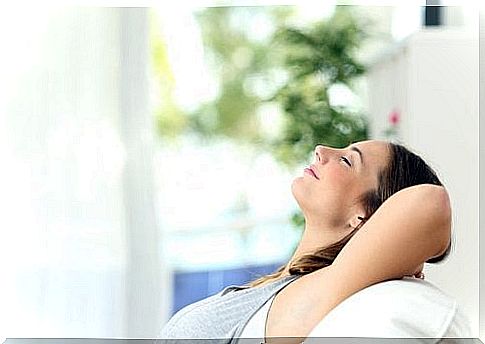 Woman lies back relaxed