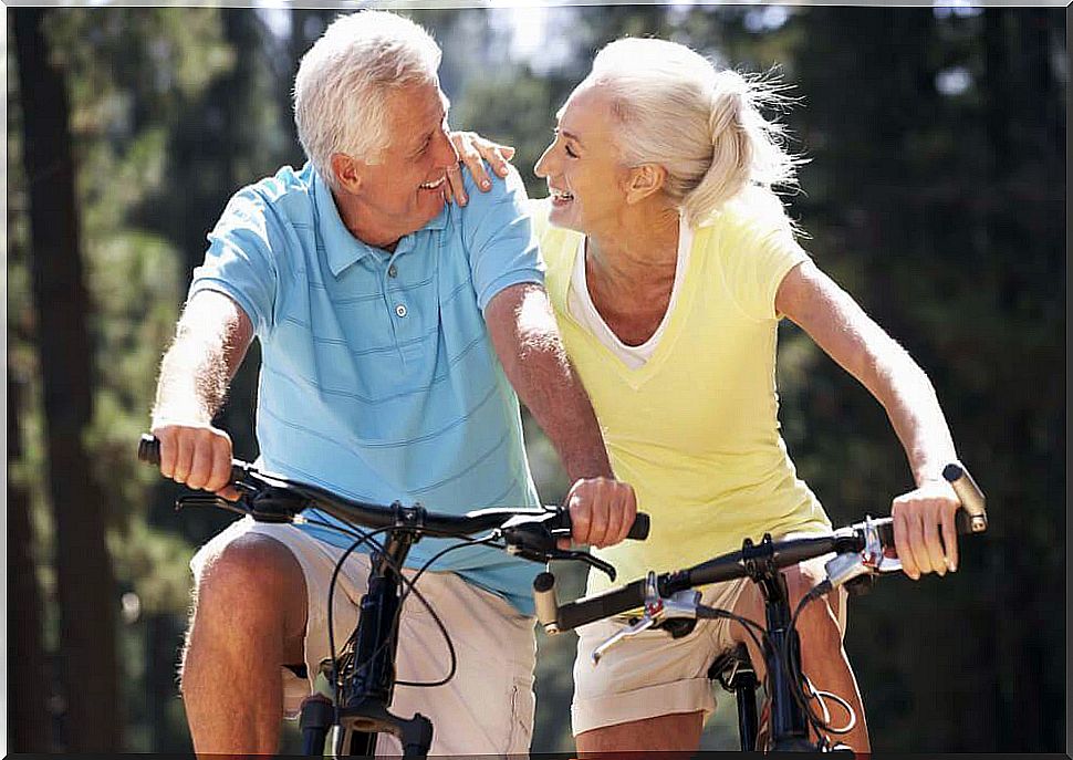 Older couple on a bicycle