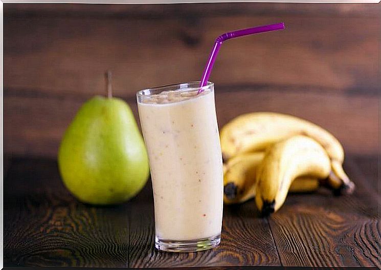 glass with banana smoothie