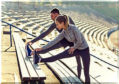 A couple doing stretching exercises together